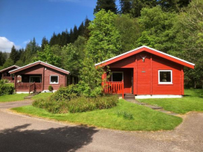 Отель Pucks Glen Lodges  Данун